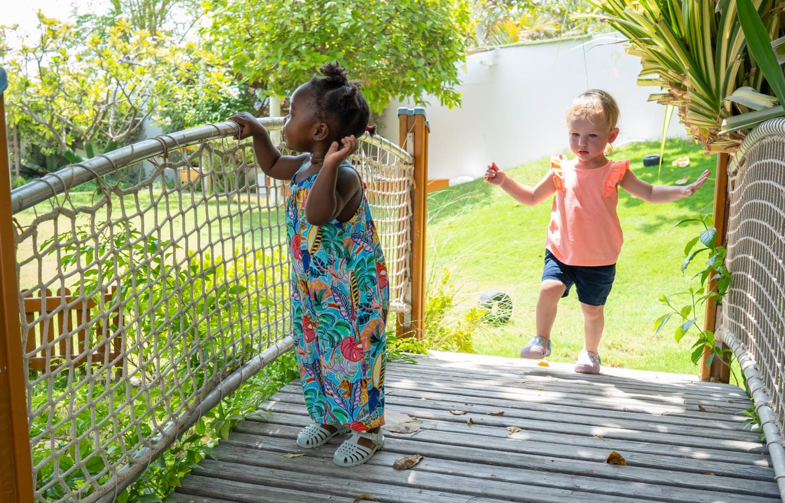 Children on wooden bridge
